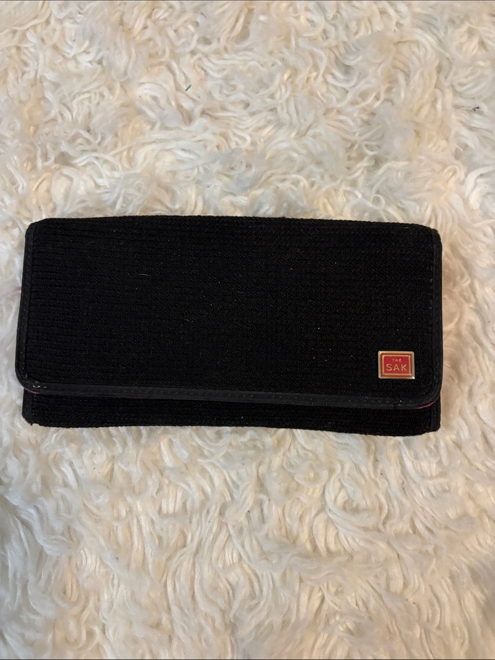 The Sak Black Wallet with Red Logo Plaque